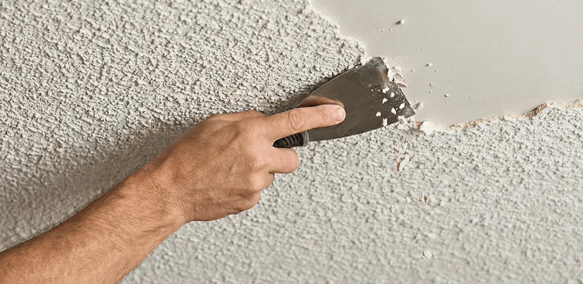Popcorn ceiling removal scraping off textured ceiling finish in Gilbert, AZ