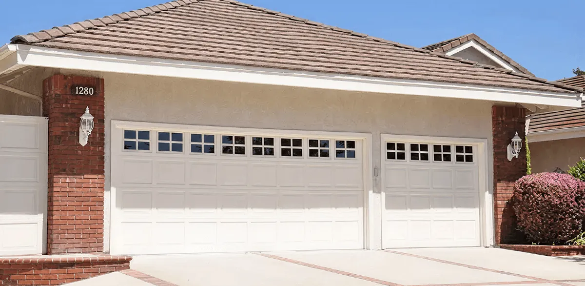 Residential garage door repair service for a double garage door in Gilbert, AZ